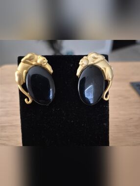 Vintage JJ 1988 panther earrings feature a gold-tone big cat